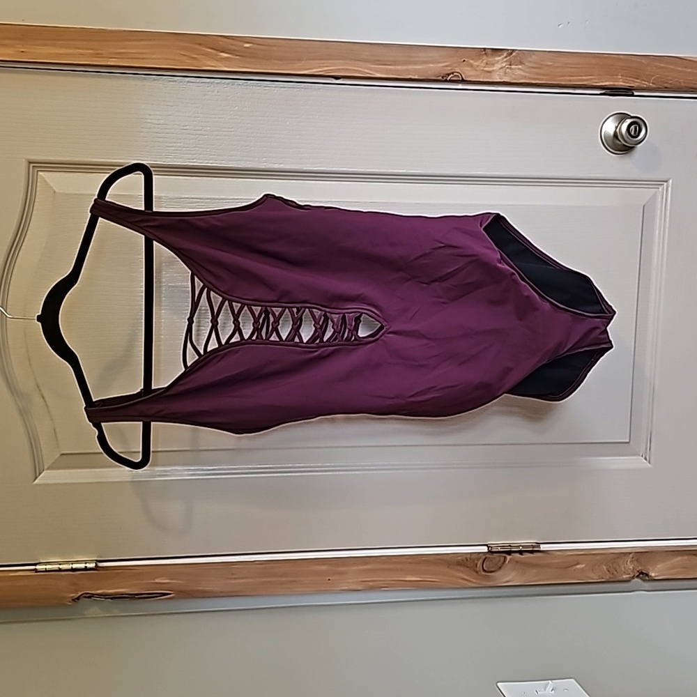 Aqua green 16w burgundy one piece swim suit laced in the front and back